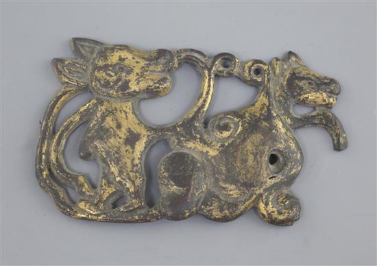 A Chinese gilt bronze harness plaque, Ordos type, Inner Mongolia, 3rd-1st century B.C., 12cm x 7cm